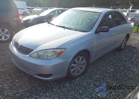2002 Toyota Camry Xle V6 z USA, uszkodzony, nr VIN 4T1BF30K92U029580